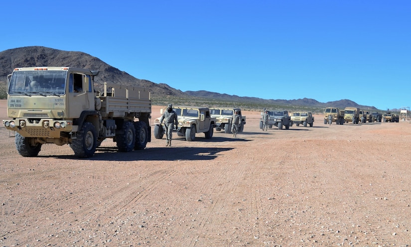 Soldiers from the 304th Sustainment Brigade arrive at Forward Operating Base Santa Fe’s motor pool before heading to FOB Miami, during a MUTA 8 four-day battle assembly, where collective training events as well as individual readiness focused on medical readiness and firearms qualification at the Fort Irwin National Training Center November 17-20, while they conducted a joint Field Training Exercise with the 650th Regional Support Group.