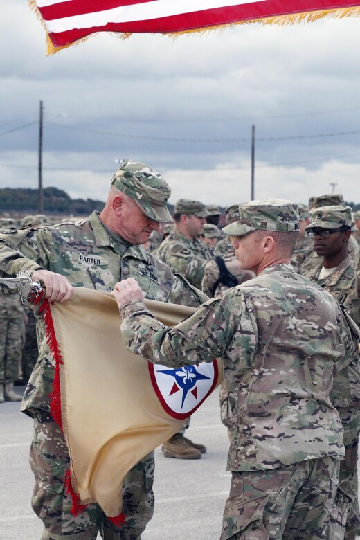 (Left) Brig. Gen. Robert D. Harter, Commanding General of the 316th Sustainment Command (Expeditionary), cases the 316th ESC guidon with Command Sgt. Maj. Johnny McPeek (Right), the 316th ESC Command Sergeant Major, during a Colors Casing ceremony at Fort Hood, Texas Nov. 28, 2016.
(U.S. Army photo by Sgt. Christopher Bigelow)