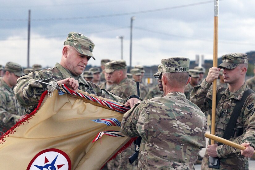 (Left) Brig. Gen. Robert D. Harter, Commanding General of the 316th Sustainment Command (Expeditionary), cases the 316th ESC guidon with Command Sgt. Maj. Johnny McPeek (Right), the 316th ESC Command Sergeant Major, during a Colors Casing ceremony at Fort Hood, Texas Nov. 28, 2016.
(U.S. Army photo by Sgt. Christopher Bigelow)