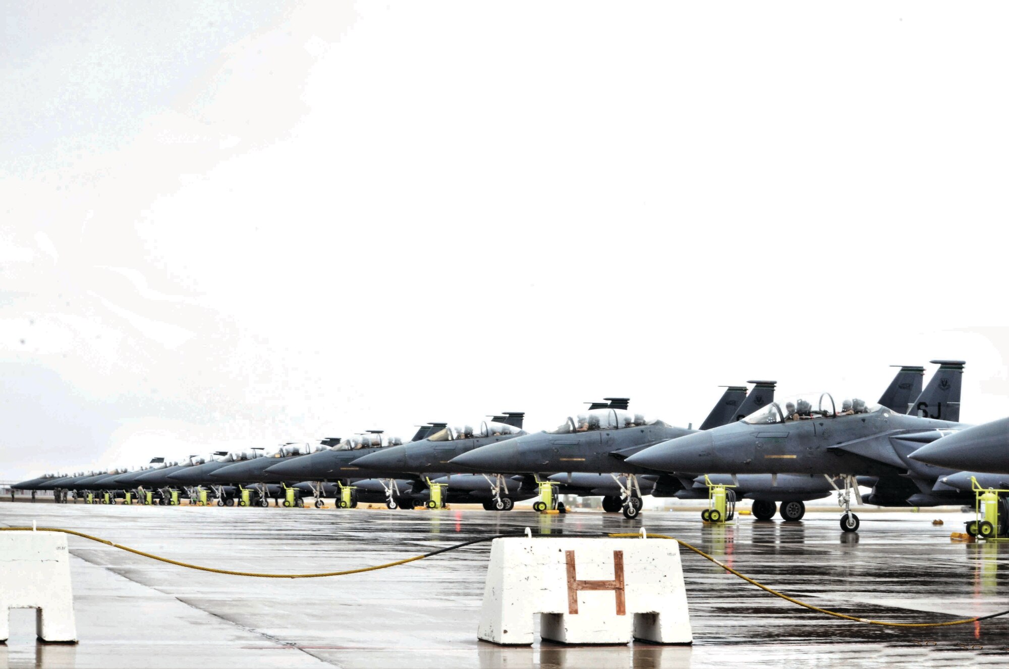 Fourteen F-15 Strike Eagle aircraft hold the line, ready to depart to Seymour-Johnson Air Force Base, North Carolina from Morón Air Base, Spain, Nov. 10, 2016. The aircraft were returning to their home station after a six-month deployment in the Middle East. (U.S. Air Force photo by Capt. Jose A. Quintanilla)