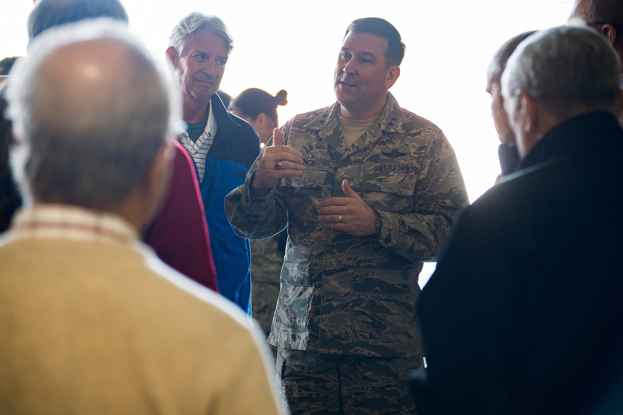 Maj. Gen. Christopher Bence, U.S. Air Force Expeditionary Center commander, talks with Air Mobility Command civic leaders during their visit to Pope Field Nov. 16. Bence toured Air Force units and joined in the AMC civic leader tour at Pope Field along with Chief Master Sgt. Larry Williams, AFEC command chief, Nov. 15-17. The general took command of the AFEC at Joint Base McGuire-Dix-Lakehurst, New Jersey, in August this year. (Air Force photo/Marc Barnes)