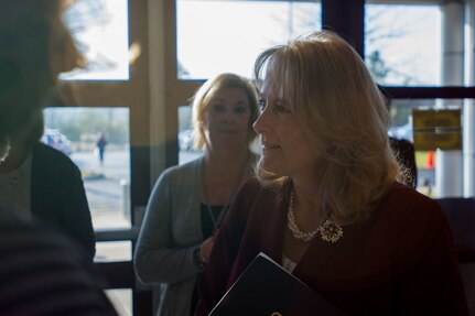 Mrs. Hollyanne Milley greets participants before the beginning of the Army Family Programs Roundtable discussion held at the 416th Theater Engineer Command Headquarters, Darien, Ill. The Roundtable discussion was a chance for spousal leadership throughout the three components of the Army to get ideas on improving the programs to meet the needs of Family readiness. Mrs. Hollyanne Milley, spouse of Chief of Staff of the United States Army, Gen. Mark Milley, represented the active Army; Mrs. Julie Luckey, spouse of Chief of Army Reserve, Lt. Gen. Charles Lucky, represented the Army Reserve; and Mrs. Danette Hayes, spouse of Adjutant General, Illinois National Guard, Maj. Gen. Richard J. Hayes Jr., represented the National Guard, November 15, 2016. (U.S. Army photo by Staff Sgt. Jason Proseus/released)