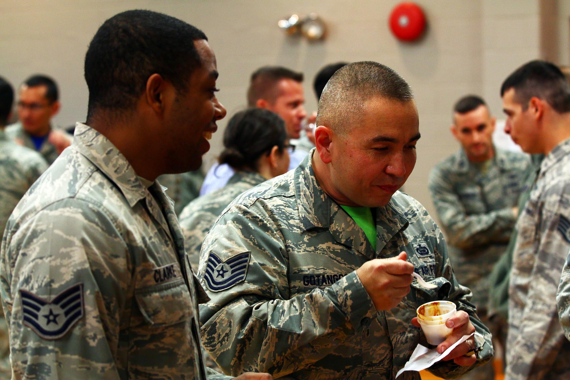 (far right) Tech. Sgt. Cresente Gotangco, Jr., 64th Intelligence Squadron, takes a sample of chili while judging the 2016 655th Intelligence, Surveillance and Reconnaissance Group Chili Cook-Off at the USO here Nov. 19, 2016. The four categories were: best overall, spiciest, white chili and most creative.Capt. James Spindler, 64th IS, was selected as the overall winner of the contest. (U.S. Air Force photo /Tech. Sgt. Patrick O’Reilly)