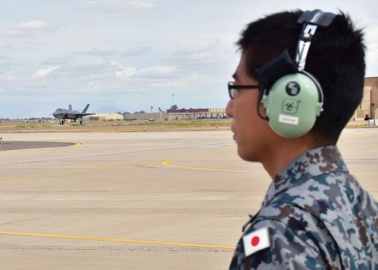 A Japan Air Self-Defense Force maintainer, prepares for the arrival of the first Japanese F-35A Nov. 28 at Luke Air Force Base, Ariz. (U.S. Air Force photo by Tech. Sgt. Louis Vega Jr.)