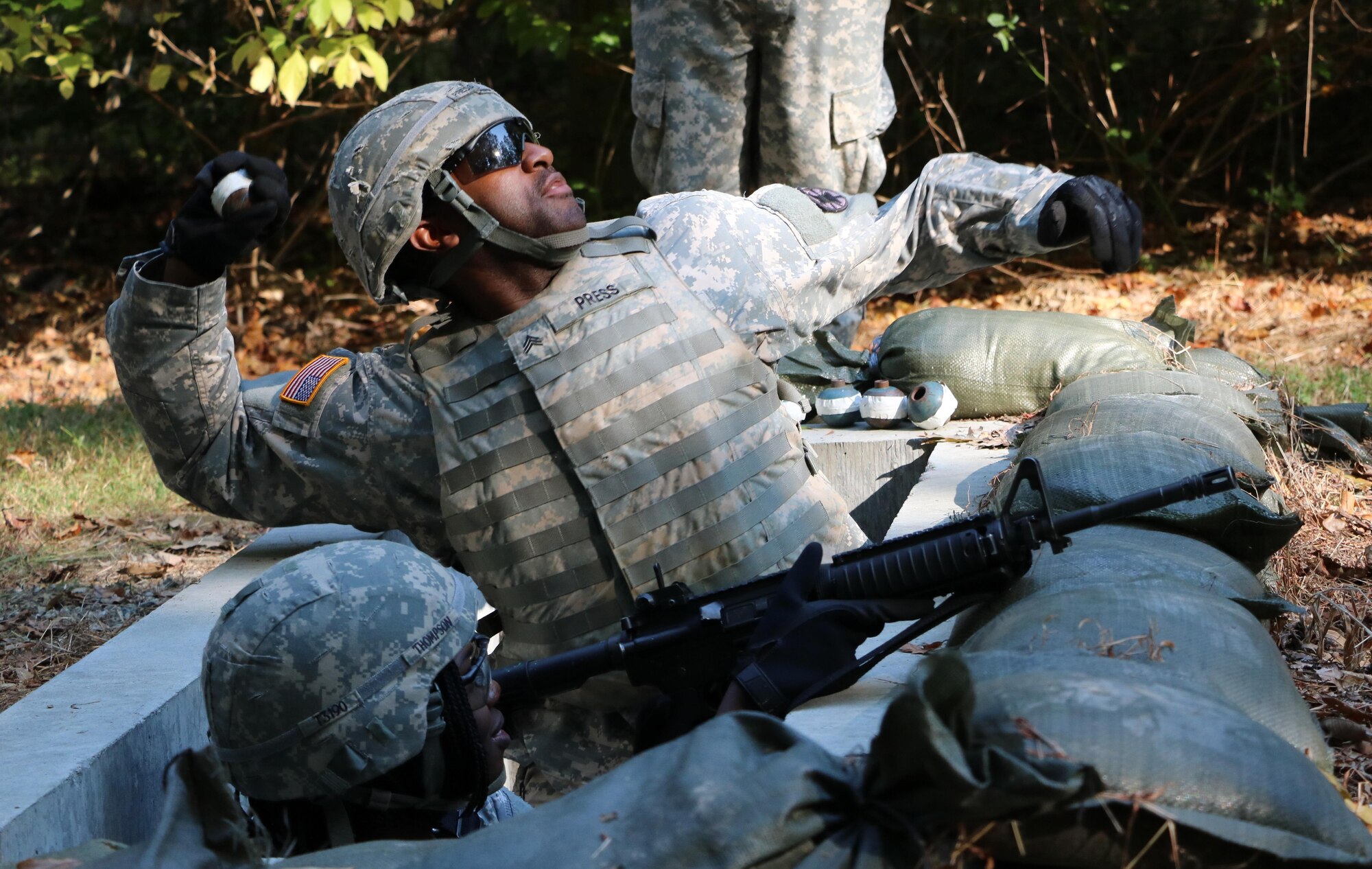 U.S. Army Sgt. Gregory Press, 7th Transportation Brigade (Expeditionary) cargo specialist, throws a practice hand grenade as part of the Siegesrader challenge at Fort Eustis Va., Nov. 1, 2016. The challenge was comprised of Army warrior tasks, battle drills and focused on unit cohesion and effectiveness. (U.S. Army photo by Spc. Wilmarys Roman Rivera)