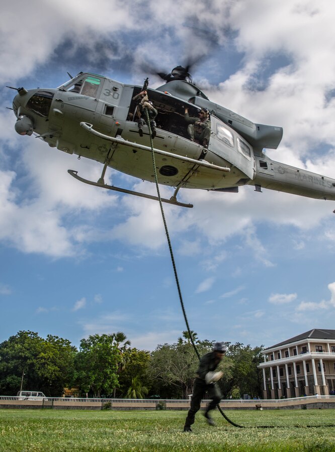 TRINCOMALEE, Sri Lanka (Nov. 23, 2016) Sri Lankan Navy Special Boat Squadron Sailors fast rope out of a UH-1Y Huey helicopter during a Theater Security Cooperation engagement at Sri Lanka Naval Base, Trincomalee, Nov. 23, 2016. The SBS Sailors conducted multiple fast rope repetitions during the training exercise.  The Marines and Sailors of the 11th Marine Expeditionary Unit are conducting the exchange with Sri Lankan forces to enhance tactical skillsets and disaster relief capabilities while strengthening the overall relationship between the two militaries.  (U.S. Marine Corps photo by
Gunnery Sgt. Robert B. Brown/Released)
