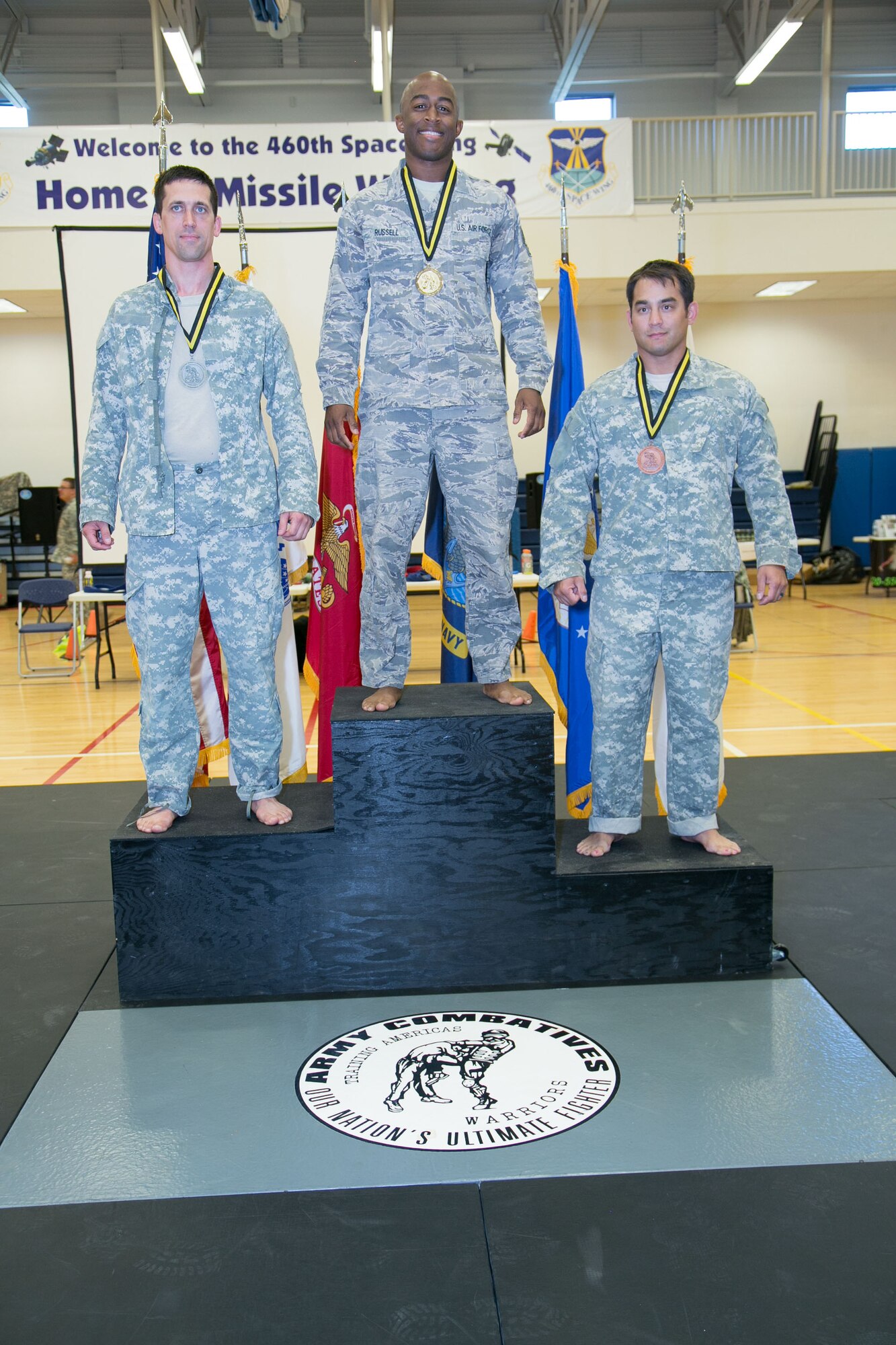 Staff Sgt. Brandon Russell, Air Reserve Personnel Center, is awarded first place in his division during an Army Combatives Tournament at Buckley Air Force Base, Colo., Oct. 26. Russell defeated more than 15 Soldiers and was awarded an Army Achievement Medal. (Courtesy photo by Annabel Flores)