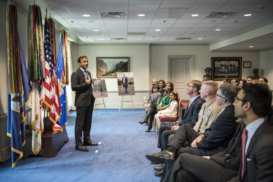 DJ Patil, White House chief data scientist, speaks during a ceremony to award him the Department of Defense Medal for Distinguished Public Service at the Pentagon, Nov. 29, 2016. Defense Secretary Ash Carter, seated fourth from right, presented the medal to Patil. DoD photo by Air Force Tech. Sgt. Brigitte N. Brantley