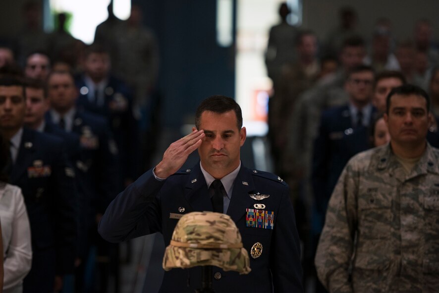 Col. Jeffery Valenzia, 93d Air Ground Operations Wing commander, renders a final salute to mourn the loss of Senior Airman Sebastian Jenkins, 822d Base Defense Squadron fire team member, during a memorial service, Nov. 29, 2016, at Moody Air Force Base, Ga. Jenkins completed his entire Air Force career at Moody and deployed twice in support of Operation Inherent Resolve in Southwest Asia. (U.S. Air Force photo by Airman 1st Class Greg Nash)