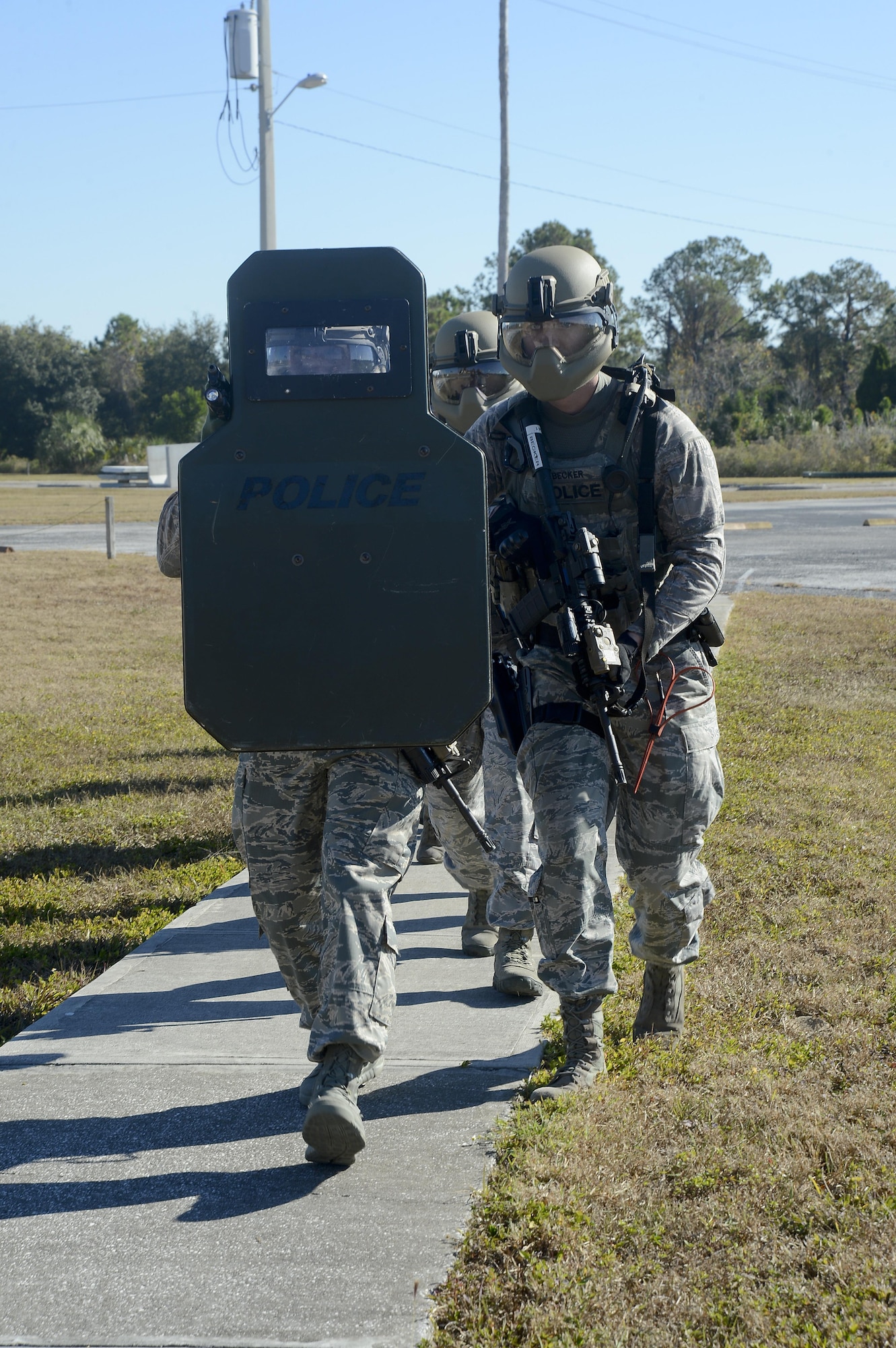 Emergency services team (EST) members assigned to the 6th Security Forces Squadron prepare to clear a building during an immersion, Nov. 21, 2016 at MacDill Air Force Base, Fla. The EST functions are similar to civilian police departments Special Weapons and Tactics Team. (U.S. Air Force photo by Senior Airman Jenay Randolph)