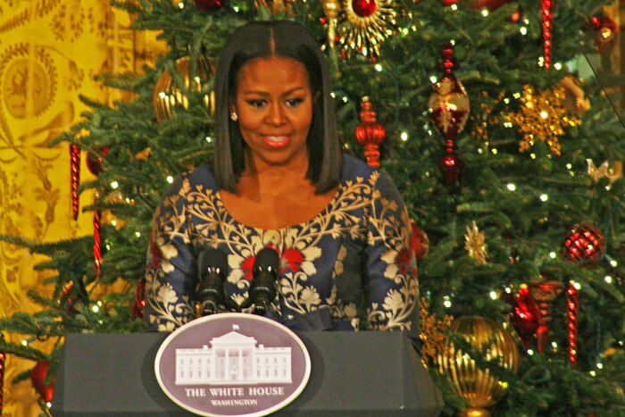 First Lady Michelle Obama addresses nearly 200 military families in the East Room of the White House during the eighth annual military family preview of White House holiday décor, Nov. 29, 2016. DoD photo by Terri Moon Cronk
