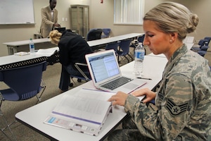 Staff Sgt. Kallie Czenkus, an intelligence analyst with the 171st Air Refueling Squadron, prepares for an evening class a Northwood University’s satellite campus at Selfridge Air National Guard Base. Czenkus is completing her requirements to earn an associate degree with the Community College of the Air Force. (U.S. Air National Guard photo by Tech. Sgt. Dan Heaton)