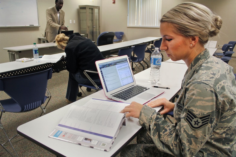 Staff Sgt. Kallie Czenkus, an intelligence analyst with the 171st Air Refueling Squadron, prepares for an evening class a Northwood University’s satellite campus at Selfridge Air National Guard Base. Czenkus is completing her requirements to earn an associate degree with the Community College of the Air Force. (U.S. Air National Guard photo by Tech. Sgt. Dan Heaton)