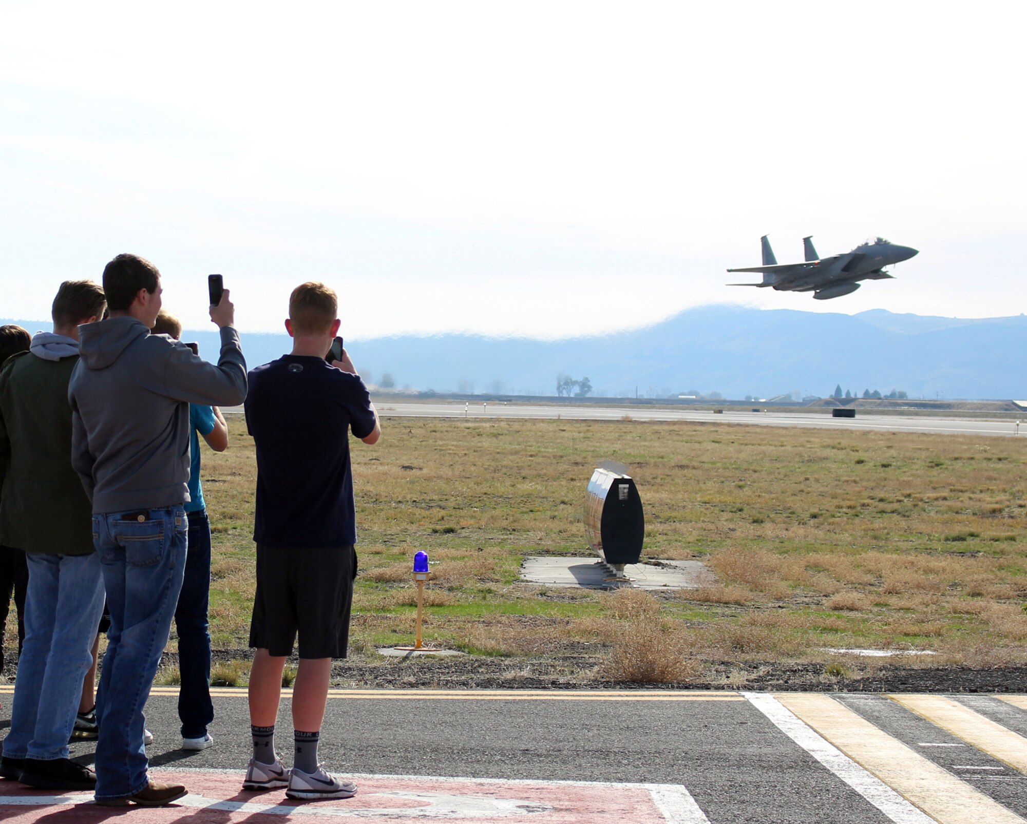 Henley High School engineering students watch F-15 Eagles take off at Kingsley Field, home of the Oregon Air National Guard's 173rd Fighter Wing. (Photo by Samantha Tipler; Klamath County School District)