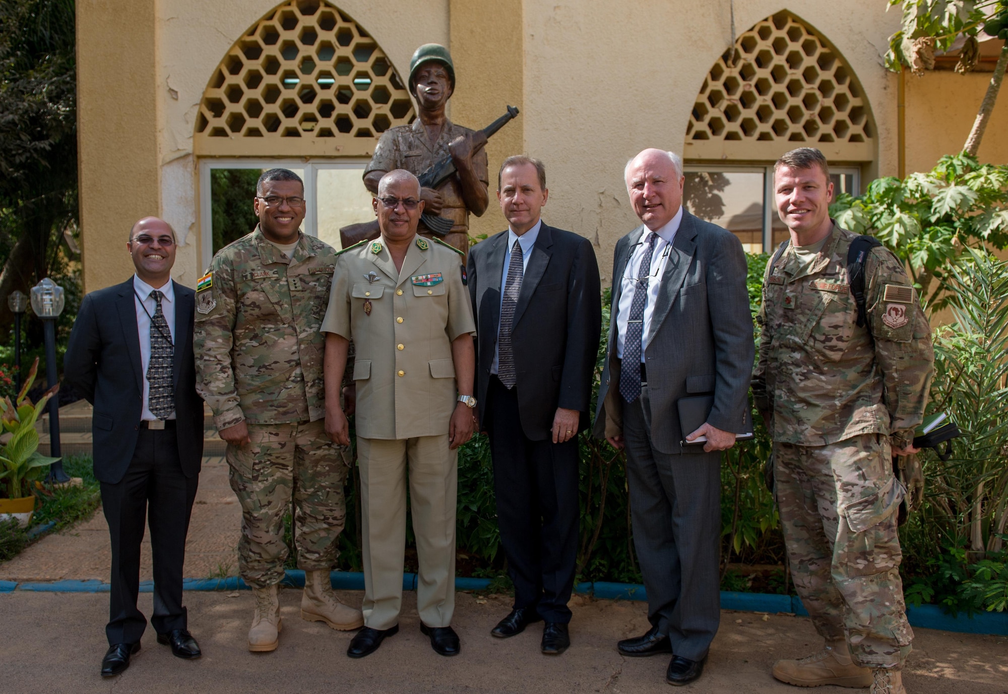 Lt. Gen. Richard Clark, 17th Expeditionary Air Force commander, poses for a photo with the deputy chief of defense for Niger during a visit to Niamey, Niger, Nov. 23, 2016. During a three day trip, Clark visited Airmen in Europe and Africa who support the Air Force's intelligence, surveillance and reconnaissance mission. This was Clark's first visit to NAS Sigonella, Niamey and Agadez as 17th Expeditionary Air Force commander. (U.S. Air Force photo by Tech. Sgt. Ryan Crane)