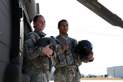 U.S. Army Capt. Brittany Pearson and Chief Warrant Officer 2 Damon Lappe are HH-60M Black Hawk helicopter pilots with Company C, 1st Battalion, 189th Aviation Regiment, South Dakota Army National Guard, at the Army Aviation Support Facility in Rapid City, S.D., Nov. 5, 2016. Pearson and Lappe made their dream of flying a reality by serving in the SDARNG. 