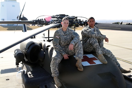 U.S. Army Capt. Brittany Pearson and Chief Warrant Officer 2 Damon Lappe are HH-60M Black Hawk helicopter pilots with Company C, 1st Battalion, 189th Aviation Regiment, South Dakota Army National Guard, at the Army Aviation Support Facility in Rapid City, S.D., Nov. 5, 2016. Pearson and Lappe made their dream of flying a reality by serving in the SDARNG.