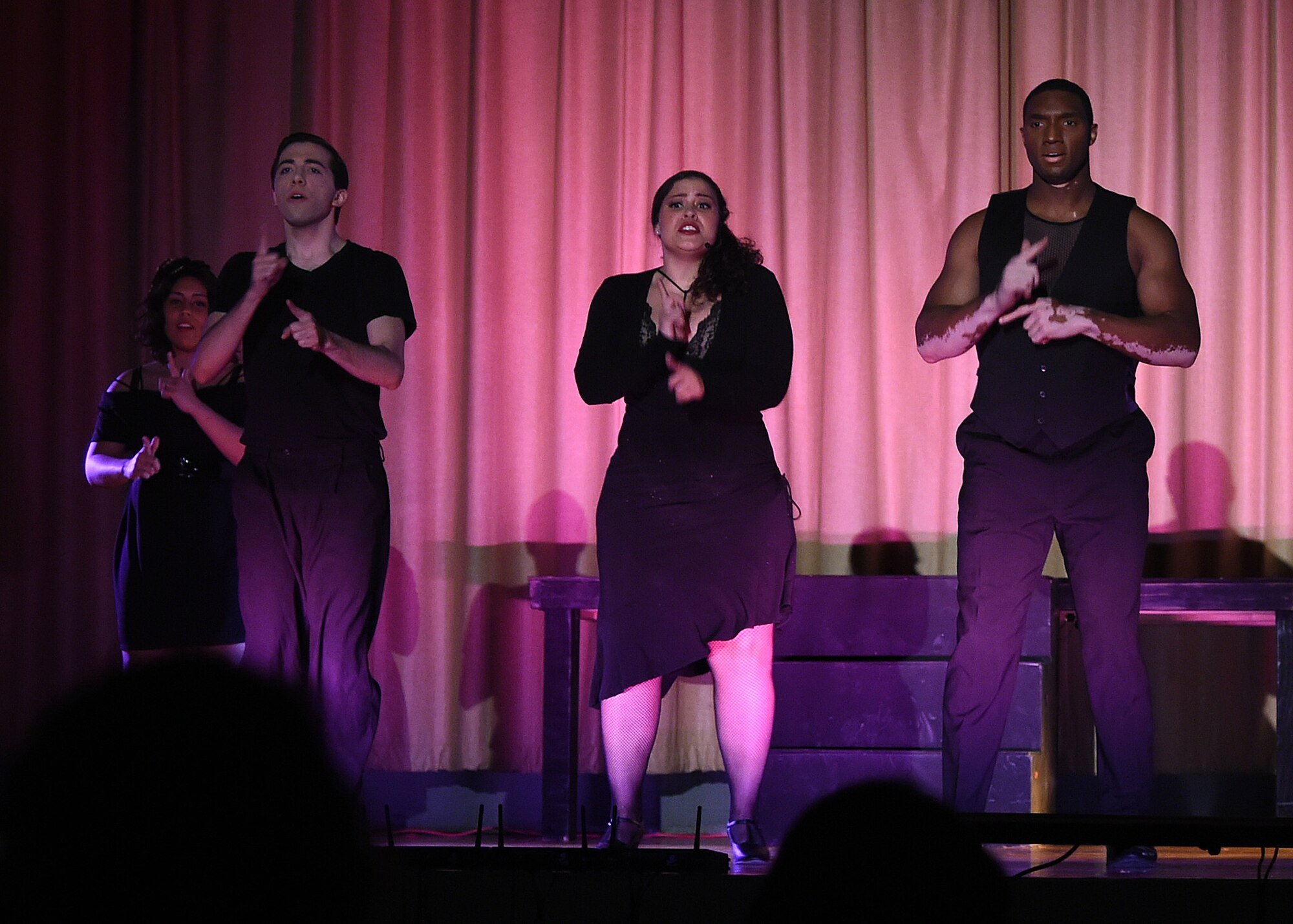 Members of the Luke Experience group perform "Chicago" Nov. 18, 2016 at Luke Air Force Base, Ariz. The play was put on by Luke Experience, which is an on-base community theater group of which people can come, audition, and perform in a show for the families of the Department of Defense and military  personnel. (U.S. Air Force photo by Senior Airman Devante Williams)