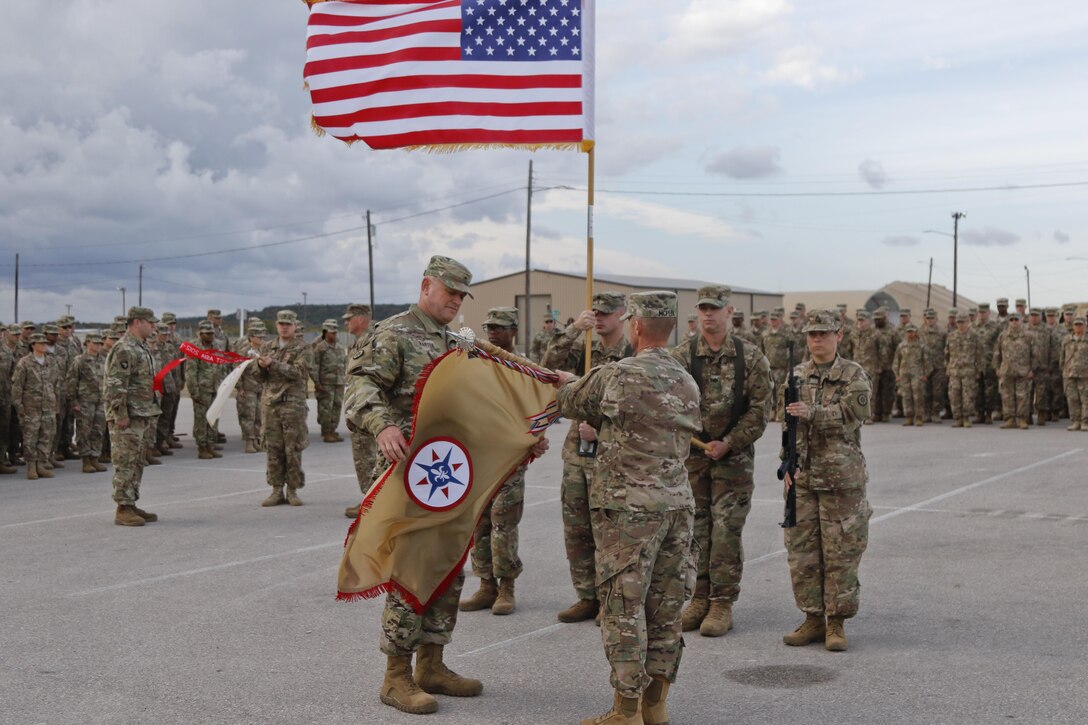 The 316th Sustainment Command (Expeditionary), an Army Reserve unit based out of Coraopolis, Pa., performs a casing of the colors and guidon prior to deploying to Kuwait at North Fort Hood, Tx., Nov. 28, 2016. (U.S. Army photo by Staff Sgt. Dalton Smith)