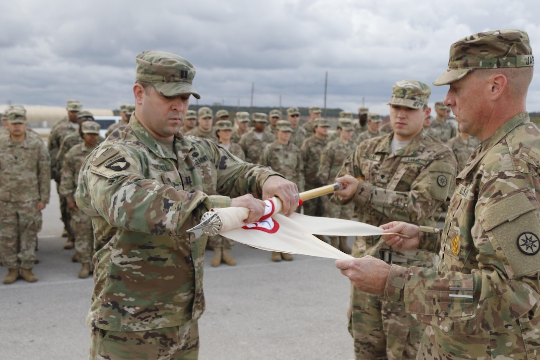 The 316th Sustainment Command (Expeditionary), an Army Reserve unit based out of Coraopolis, Pa., performs a casing of the colors and guidon prior to deploying to Kuwait at North Fort Hood, Tx., Nov. 28, 2016. (U.S. Army photo by Staff Sgt. Dalton Smith)