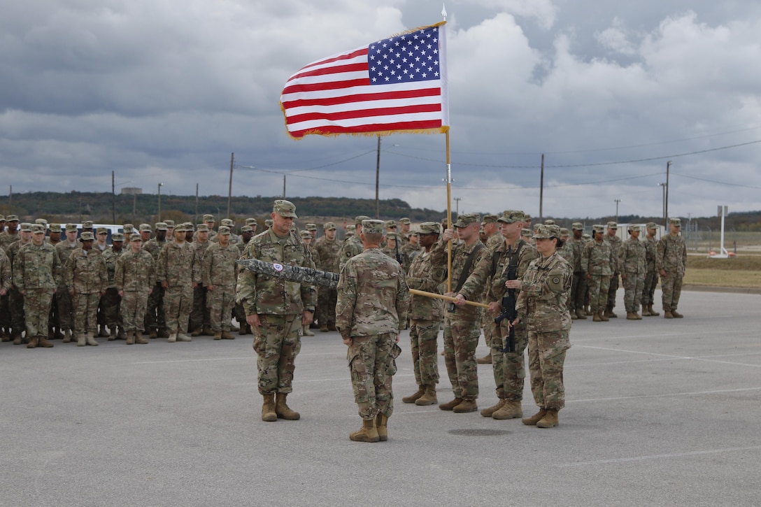 The 316th Sustainment Command (Expeditionary), an Army Reserve unit based out of Coraopolis, Pa., performs a casing of the colors and guidon prior to deploying to Kuwait at North Fort Hood, Tx., Nov. 28, 2016. (U.S. Army photo by Staff Sgt. Dalton Smith)