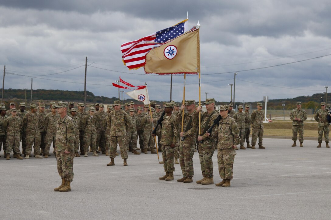 The 316th Sustainment Command (Expeditionary), an Army Reserve unit based out of Coraopolis, Pa., performs a casing of the colors and guidon prior to deploying to Kuwait at North Fort Hood, Tx., Nov. 28, 2016. (U.S. Army photo by Staff Sgt. Dalton Smith)