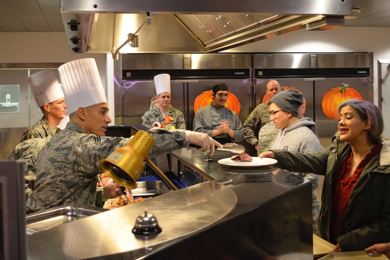 THULE AIR BASE, Greenland - Senior leaders from the 821st Air Base Wing serve Thanksgiving meals at the Dundas Buffet Restaurant to approximately 222 Airmen and international partners who are stationed at Thule Air Base, Greenland, Nov. 24, 2016. The buffet restaurant provided 312 pounds of turkey, 80 pounds of tenderloin, 80 pounds of ham and 48 pies to the base members. (Courtesy photo by Master Sgt. Stoney Bair)