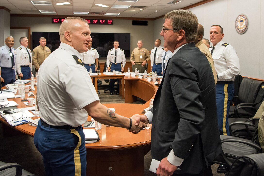 Defense Secretary Ash Carter speaks with Army Command Sgt. Maj. John W. Troxell, senior enlisted advisor to the chairman of the Joint Chiefs of Staff, during the 2016 Defense Senior Enlisted Council at the Pentagon, Nov. 30, 2016. DoD photo by Army Sgt. Amber I. Smith