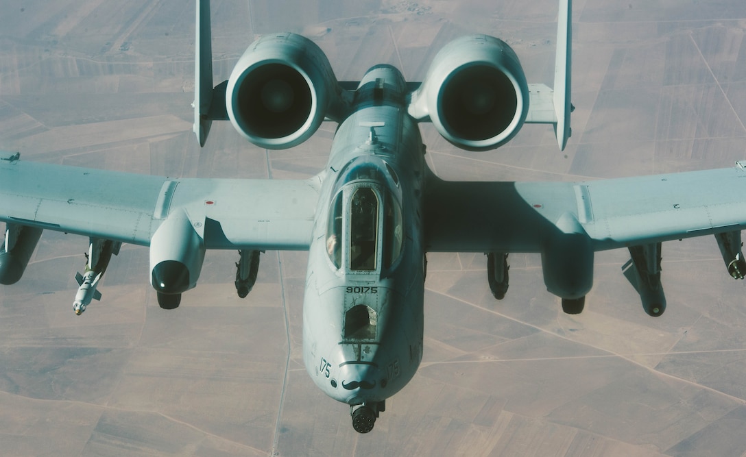 A U.S. Air Force A-10 Thunderbolt prepares to peel off after refueling from a 340th Expeditionary Air Refueling Squadron KC-135 Stratotanker over Iraq, Nov. 29, 2016. The 340th EARS extend the fight against Da'esh by delivering 60,000 pounds of fuel to USAF A-10 Thunderbolts, F-15 Strike Eagles and U.S. Marine EA-6B Prowlers. (U.S. Air Force photo by Senior Airman Jordan Castelan)