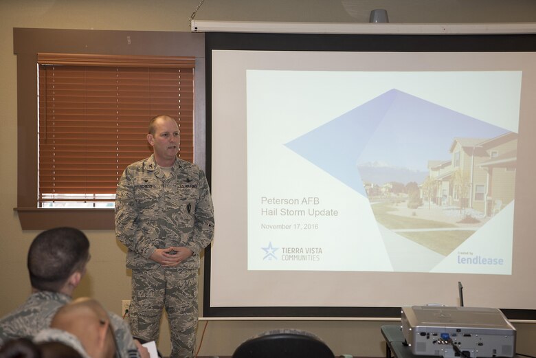PETERSON AIR FORCE BASE, Colo. - Col. Doug Schiess, 21st Space Wing commander, speaks to housing residents during a town hall meeting at Peterson Air Force Base, Colo., Nov. 18, 2016. The town hall informed residents of Tierra Vista Community about the repair plans for homes damaged during the hail storm that occurred here on July 28. (U.S. Air Force photo by
Steve Kotecki)