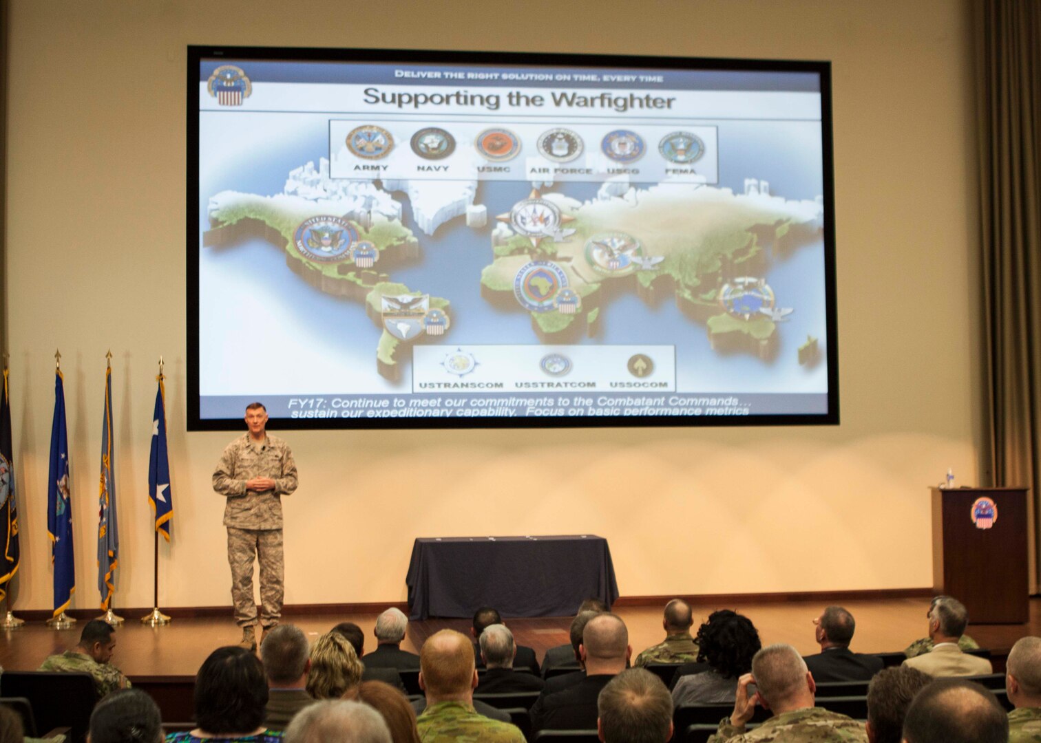 DLA Director Air Force Lt. Gen. Andy Busch hosts the inaugural town hall in the new Distribution headquarters building on Nov. 18.