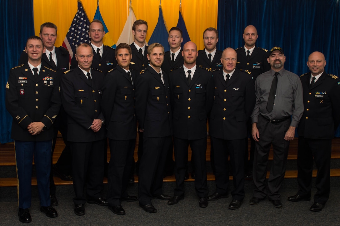 Swedish air force members graduated from the Aircraft and Systems Repairer course at Joint Base Langley-Eustis, Va., Nov. 23, 2016. The course was specifically developed for Swedish officer and NCO UH-60 Blackhawk maintainers. (U.S. Air Force photo by Airman 1st Class Derek Seifert)