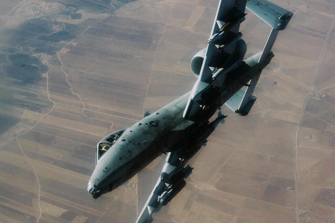 An Air Force A-10 Thunderbolt prepares to fly off after refueling from a KC-135 Stratotanker over Iraq, Nov. 29, 2016, in support of Operation Inherent Resolve. Air Force photo by Senior Airman Jordan Castelan