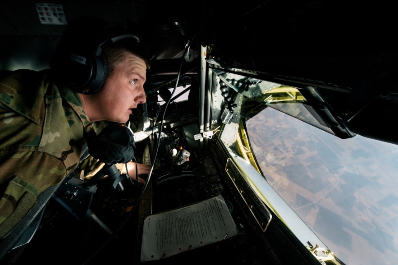 Air Force Senior Airman Kix Payne, a 340th Expeditionary Air Refueling Squadron boom operator, prepares for a Marine EA-6B Prowler to refuel over Iraq, Nov. 29, 2016. The 340th EARS extend the fight against the Islamic State of Iraq and the Levant by delivering 60,000 pounds of fuel to Air Force A-10 Thunderbolts, F-15 Strike Eagles and Marine Corps EA-6B Prowlers. Air Force photo by Senior Airman Jordan Castelan
