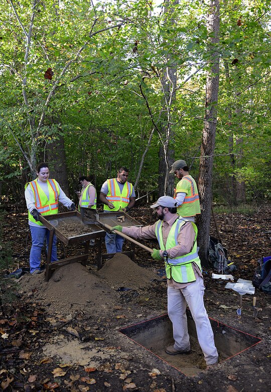Contractors and archeologists from the 733rd Civil Engineer Division Environmental Element perform dig tests at Joint Base Langley-Eustis, Va., Nov. 4, 2016. Dig tests are performed to look for artifacts and any clues that indicate the historic significance of the location.  (U.S. Air Force photo by Staff Sgt. Teresa J. Cleveland)