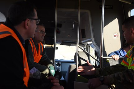 U.S. Air Force Gen. John E. Hyten (center), U.S. Strategic Command (USSTRATCOM) commander, receives a briefing from U.S. Army Col. John W. Henderson (right), U.S. Army Corps of Engineers Omaha District commander, on the way to tour USSTRATCOM’s Command and Control Facility (C2F), Nov. 28, 2016 at Offutt Air Force Base, Neb. The U.S. Army Corps of Engineers tracks the schedule and budget of the C2F construction project while meeting safety and national security requirements. One of nine DoD unified combatant commands, USSTRATCOM has global strategic missions, assigned through the Unified Command Plan, which include strategic deterrence; space operations; cyberspace operations; joint electronic warfare; global strike; missile defense; intelligence, surveillance and reconnaissance; combating weapons of mass destruction; and analysis and targeting. (USSTRATCOM photo by Master Sgt. April Wickes)