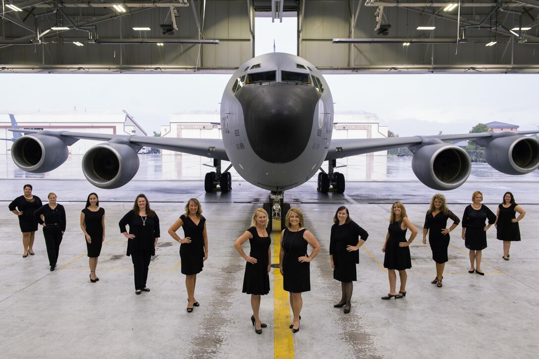 Members of the 434th Air Refueling Wing Key Support Team pose for a photo in front of a KC-135R Stratotanker at Grissom Air Reserve Base, Ind., Oct. 1, 2016. The Key Support Team, formerly Key Spouse Program, was established as a quality of life initiative out of concern for Air Force families after the results of a total-Air Force community action plan found a missing link between military members and their families. (U.S. Air Force photo/Tech. Sgt. Benjamin Mota)
