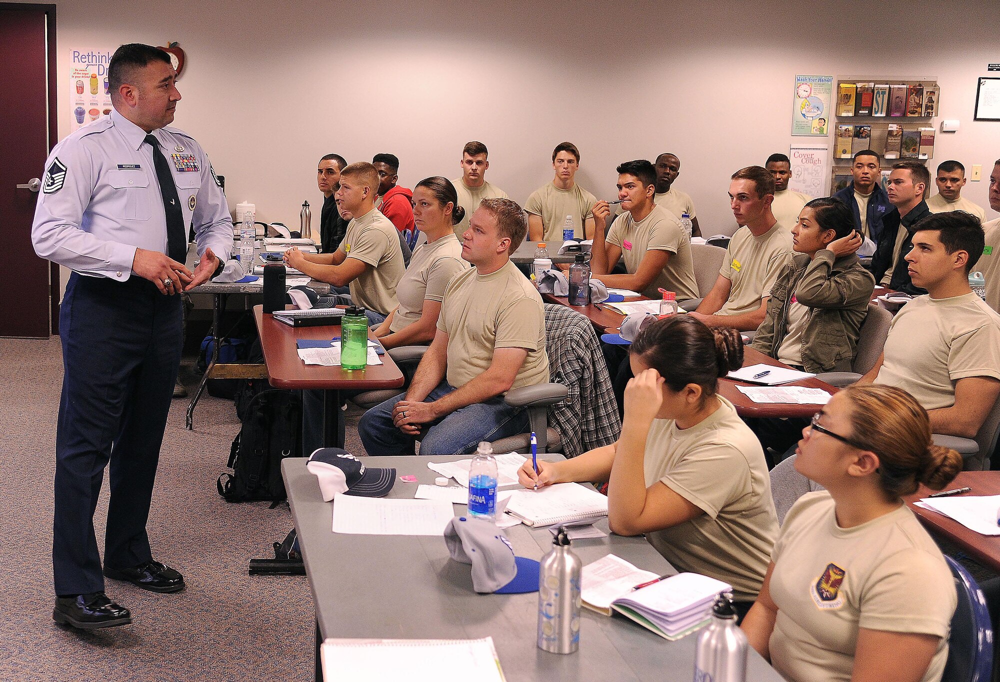 Master Sgt. Jose Rodriguez, 433rd Training Squadron, Lackland Air Force Base, Texas, speaks to 302nd Airlift Wing and 310th Space Wing trainees from the Development and Training Flight Nov. 6, 2016, here. Rodriquez and Tech. Sgt. Rene Riojas, also a Military Training Instructor with the 433rd TS, visit Air Force bases around the country to recruit Air Force Reservists into the MTI program. Members can serve as an MTI for a four-year commitment then return to his or her training specialty. “This is the best job I have ever had,” said Rodriquez. “You can directly impact the Air Force Reserve by training new Reservists.” There are active Guard and Reserve positions as well as traditional Reserve slots. To be eligible you must be E-5 (promotable to technical sergeant) to E-7, among other requirements. For more information contact Master Sgt. Carlos Recoder at carlos.recoder@us.af.mil. (U.S. Air Force photo/Staff Sgt. Amber Sorsek)