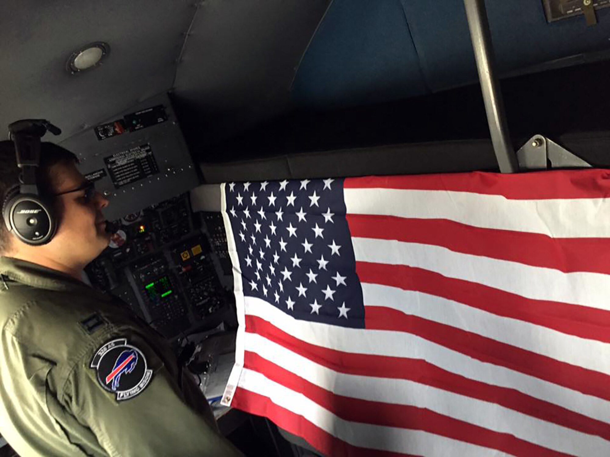 The 914th Airlift Wing completed its final C-130 flyover over New Era Field in Orchard Park, N.Y. during the NFL Buffalo Bills vs Jacksonville Jaguars game November 27.  This was the last in a long history of C-130 flyovers at New Era Field by the 328th Airlift Squadron as they begin transitions to the KC-135 Stratotanker.  To help commemorate the occasion a U.S. flag was flown aboard the aircraft.  (U.S. Air Force photo by Senior Airman Joshua Williams)

