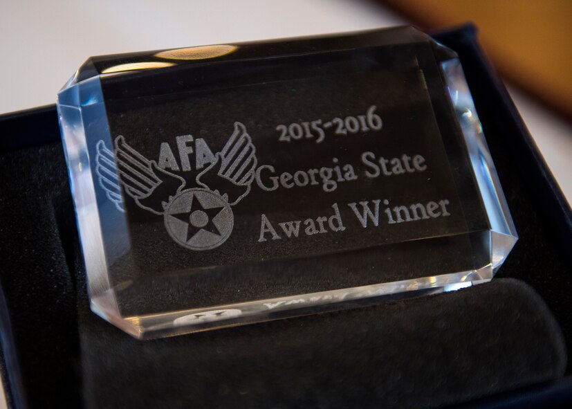 An award sits in a box at a Georgia State Air Force Association awards program, Nov. 29, 2016, at Moody Air Force Base, Ga. Each year Georgia’s AFA honors the outstanding achievements in the Air Force, government, aerospace industry and academia. (U.S. Air Force photo by Airman 1st Class Janiqua P. Robinson)
