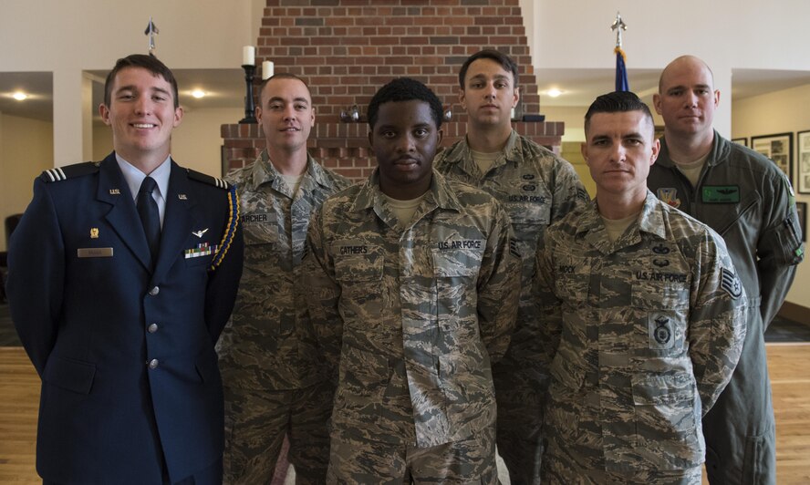 Award winners pose for a photo after a Georgia State Air Force Association awards program, Nov. 29, 2016, at Moody Air Force Base, Ga. Among the six photographed are the winners of outstanding Air Force Reserve Officer Training Corps cadet, rescue technician, logistics achievement, mission support, base defense warrior and rescue aviator. (U.S. Air Force photo by Airman 1st Class Janiqua P. Robinson)