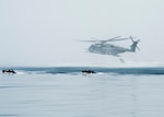 A CH-53E Super Stallion assigned to Marine Medium Tiltrotor Squadron (VMM) 163 (Reinforced), embarked aboard the amphibious assault ship USS Makin Island (LHD 8), launches a combat rubber raiding craft during a helocast training evolution with the 11th Marine Expeditionary Unit’s Maritime Raid Force, Nov. 28,2016.  Makin Island, the flagship of the Makin Island Amphibious Ready Group, is operating in the U.S. 7th Fleet area of operations with the embarked 11th Marine Expeditionary Unit in support of security and stability in the Indo-Asia-Pacific Region. 