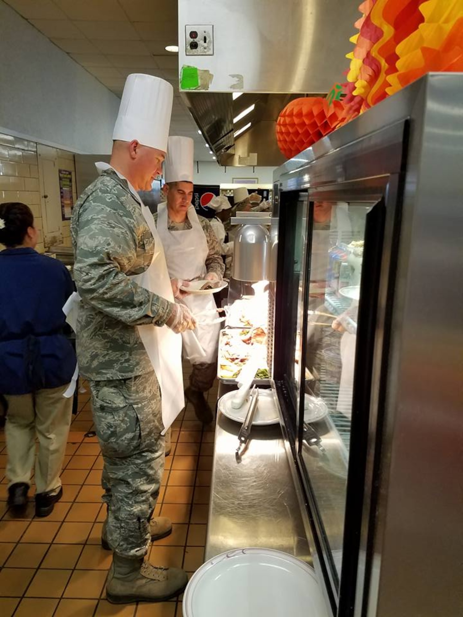 Col. Barry Dickey, 42nd Air Base Wing Vice Commander, serves a Thanksgiving meal at the Maxwell Air Force Base dining facility, Nov. 24, 2016. Base leadership spent time enjoying festivities with everyone in the facility on the holiday. (Courtesy photo)