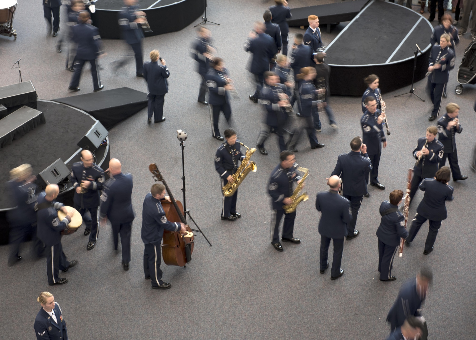 U.S. Air Force Band Commander Col. Larry H. Lang conducts the band's annual holiday flash mob performance at the Smithsonian National Air and Space Museum in Washington, D.C., Nov. 29, 2016. (U.S. Air Force by Airman Gabrielle Spalding)(released)