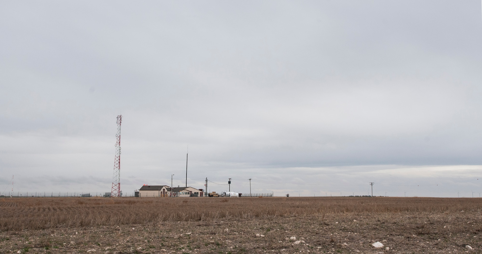 A missile alert facility stands out among its surrounding in the F.E. Warren missile complex at F.E. Warren Air Force Base, Wyo., Nov. 6, 2016. This MAF can be used as the alternative command post for the 90th MW missile complex in case communication is lost with the main command post on F.E. Warren. The 90th Missile Wing sustains 150 Minuteman III ICBMs and the associated launch facilities that cover 9,600 square miles across three states. (U.S. Air Force photo by Staff Sgt. Christopher Ruano)