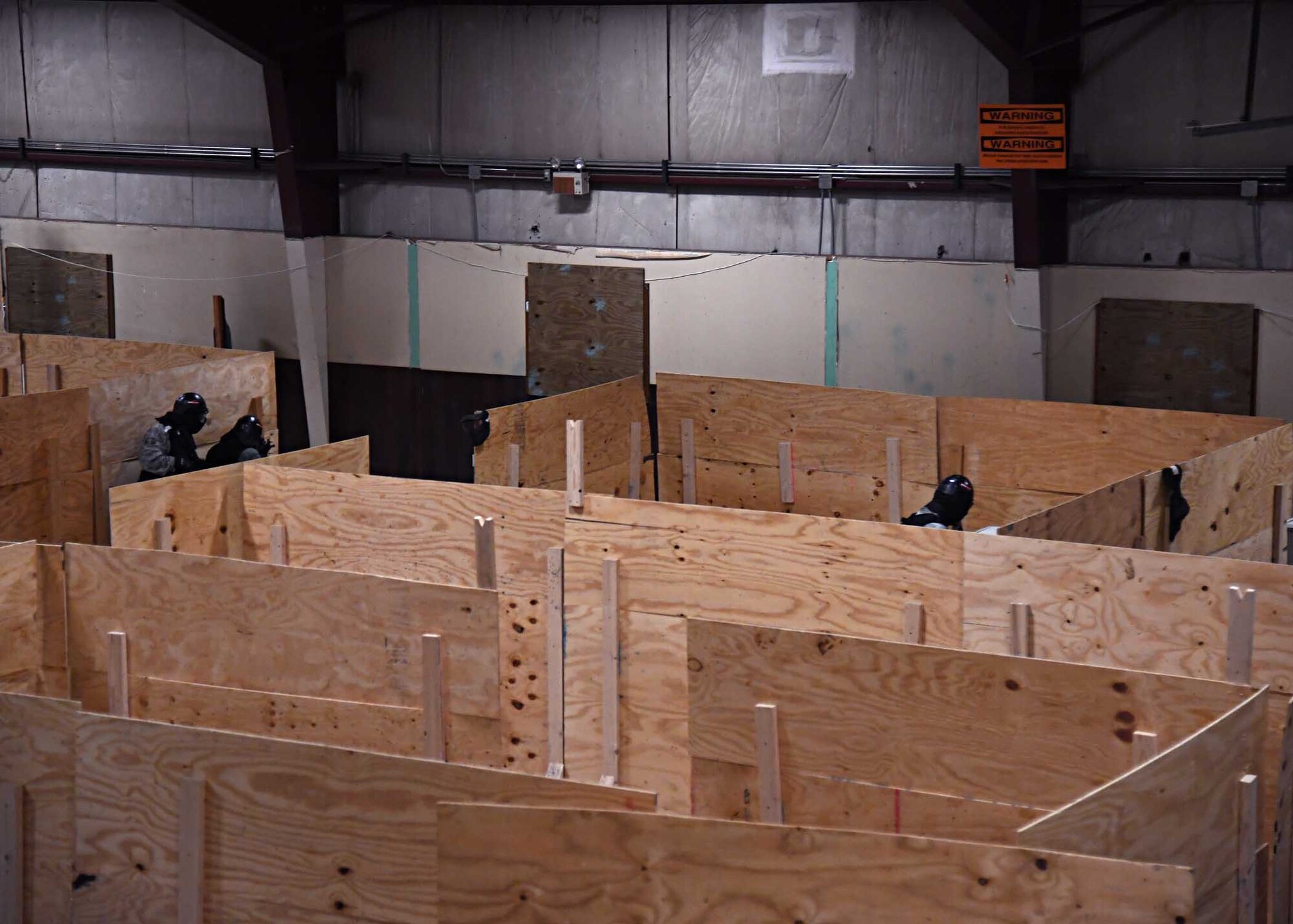 Members of the 319th Security Forces Squadron clear a room in their “shoot house” Nov. 29, 2016, on Grand Forks Air Force Base, N.D. Building clearing tactics are taught to all members of security forces to ensure they all use the same techniques in the event of a real-world contingency. (U.S. Air Force photo by Senior Airman Ryan Sparks)