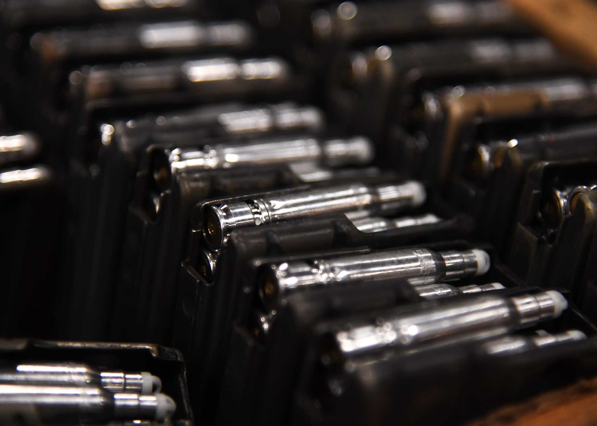 Simunition rounds sit loaded in a clip Nov. 29, 2016, on Grand Forks Air Force Base, N.D. Simunition rounds are used by the 319th Security Forces Squadron to practice their shooting techniques without needing to be at a firing range. (U.S. Air Force photo by Senior Airman Ryan Sparks)