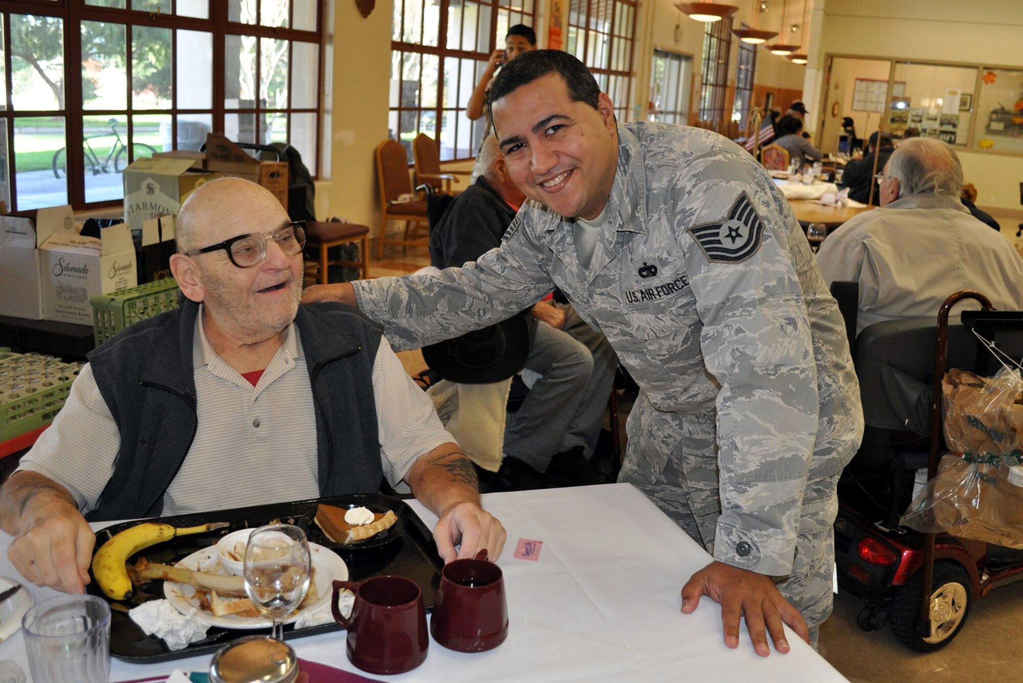 Reservist from the 349th Air Mobility Wing have been making an annual pilgrimage to the California Veterans Home, Yountville, to help serve the Thanksgiving meal. (U.S. Air Force photos/Ellen Hatfield/released)