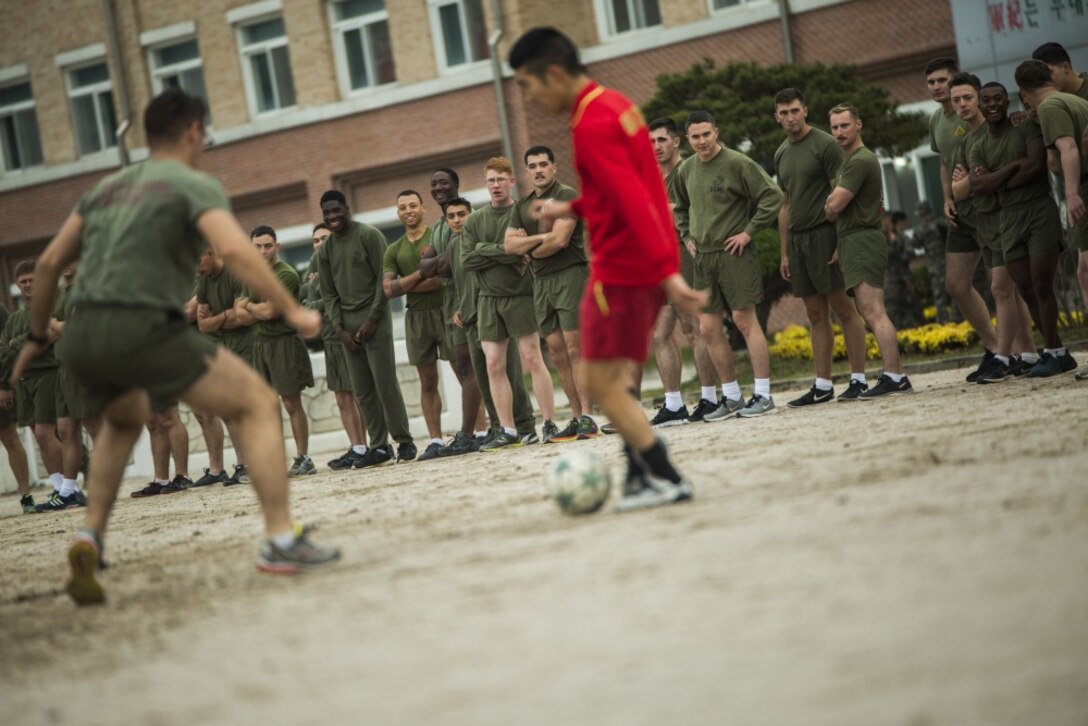 Marines observe a soccer game between U.S. and Republic of Korea Marines during Korean Marine Exercise Program 17-1 November 21, 2016 at Camp Mujuk, South Korea. KMEP highlights the two countries’ combined commitment to the defense of the ROK and our shared commitment to peace and security in the region. The U.S. Marines are assigned to 3rd Battalion, 2nd Marine Regiment, which is forward deployed from Camp Lejeune, North Carolina, to 3rd Marine Division, based in Okinawa, Japan. (U.S. Marine Corps photo by Sgt. Isaac Ibarra/Released)