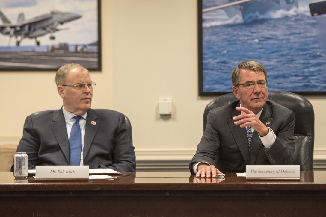 Defense Secretary Ash Carter, right, and Deputy Defense Secretary Bob Work meet with representatives from military and veteran service organizations at the Pentagon, Nov. 30, 2016. DoD photo by Air Force Tech. Sgt. Brigitte N. Brantley